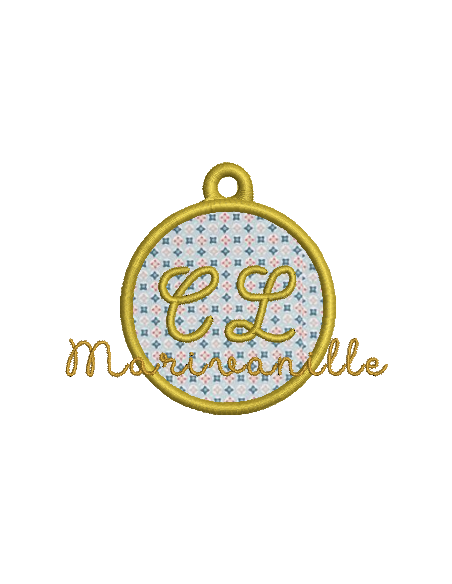 Porte clés avec médaille vide en appliqué