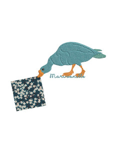 Canard qui tient un doudou